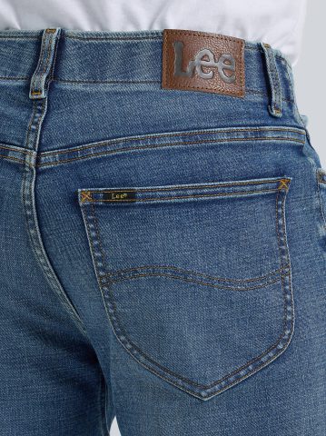 Men's Extreme Motion Regular Taper Jean